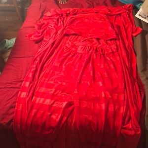 A 3 piece all red outfit.